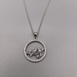 Colgante con pareja de pajaritos con circonitas en plata de ley