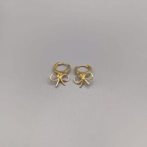 Pendientes en plata de ley con aros con lazos y articulados,